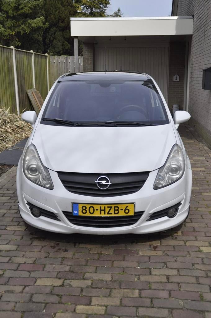 Opel Corsa 1.4 16V 3D WR 2009 Wit, Auto's, Voorwielaandrijving, 40 €/maand, 4 cilinders, Wit