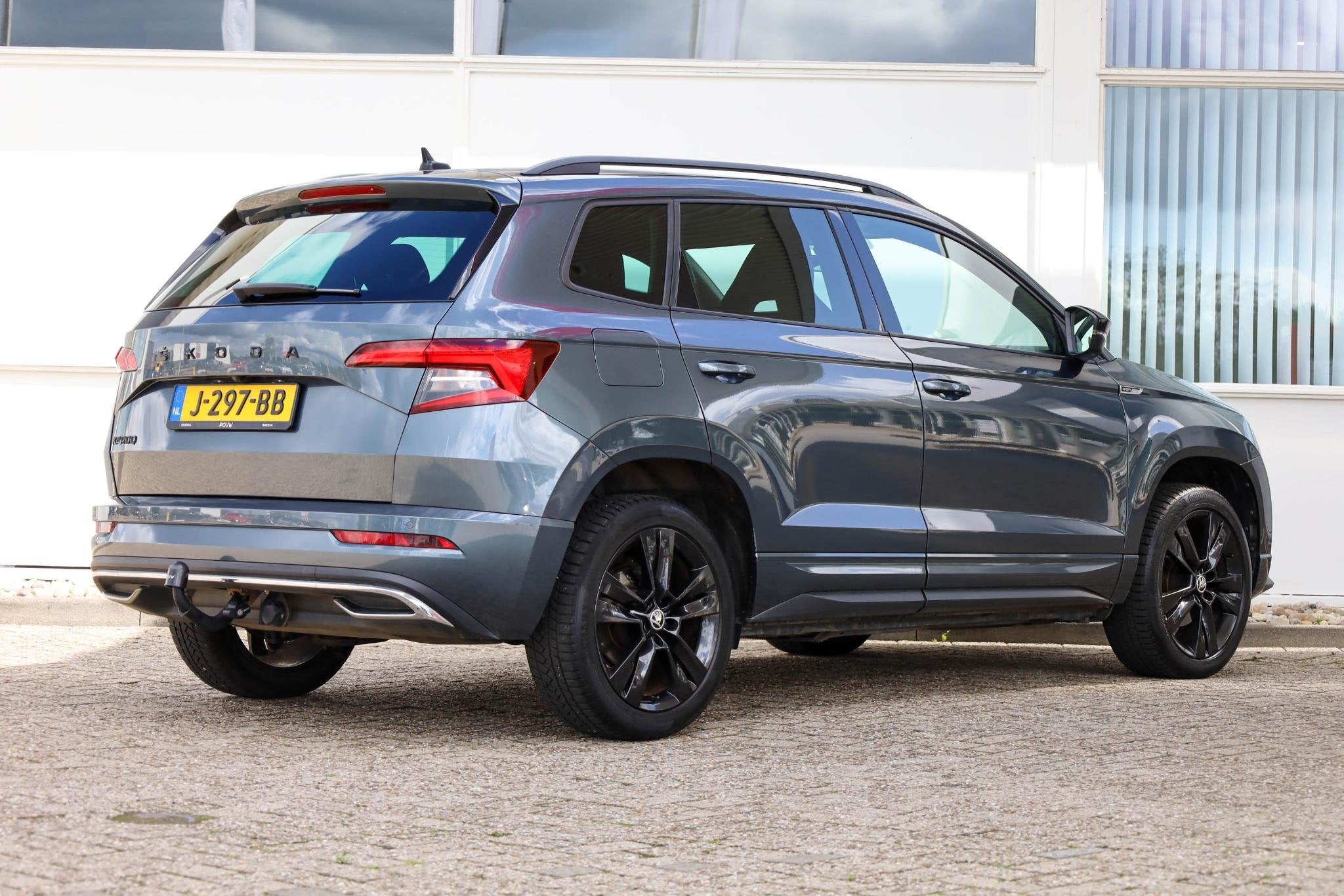 Skoda Karoq 1.5 TSI 150pk DSG ACT Sportline Business | Achte, 12 maanden, Stof, 4 cilinders, Bedrijf
