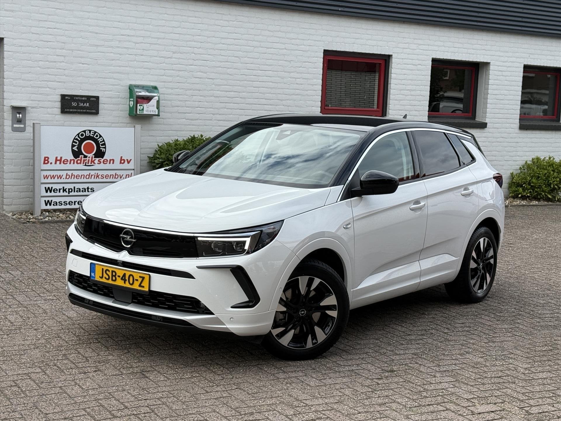 Opel Grandland 1.6 Turbo Hybrid 225pk Aut Ultimate/ SOH 99.2, Auto's, 4 cilinders, Wit, Bedrijf, Hybride Elektrisch/Benzine