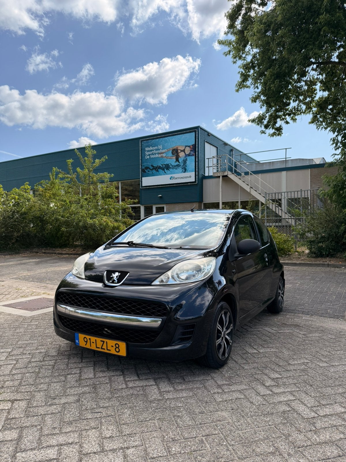 Peugeot 107 1.0 12V 3DR 2010 Zwart, Voorwielaandrijving, Stof, 4 stoelen, Origineel Nederlands