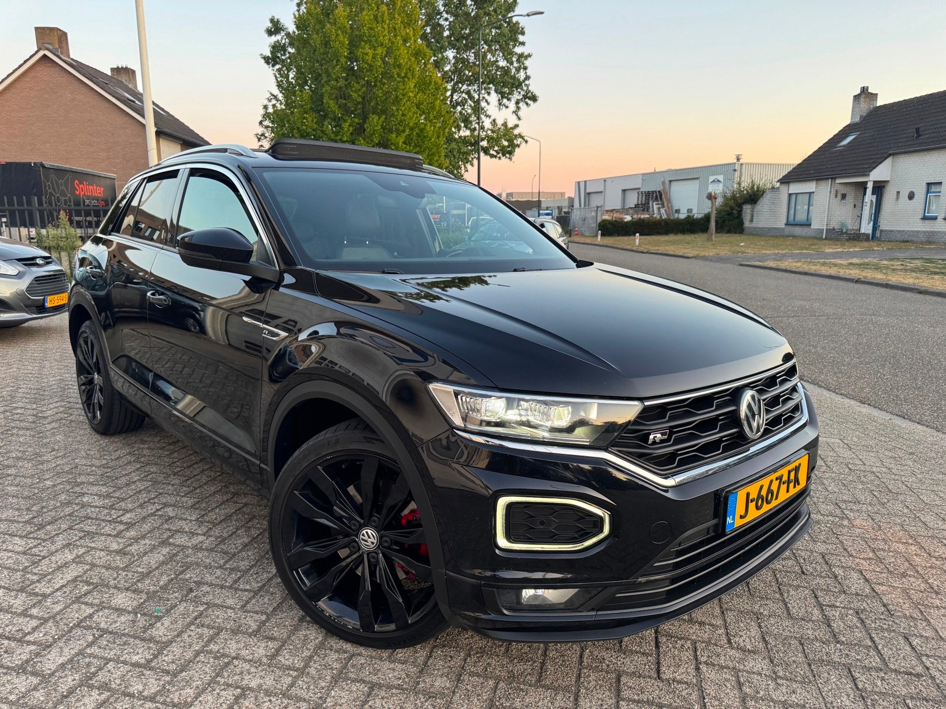 Volkswagen T-Roc 1.5 TSI Sport R-Line DSG,Panodak,Camera, Euro 6, 4 cilinders, Zwart, Bedrijf