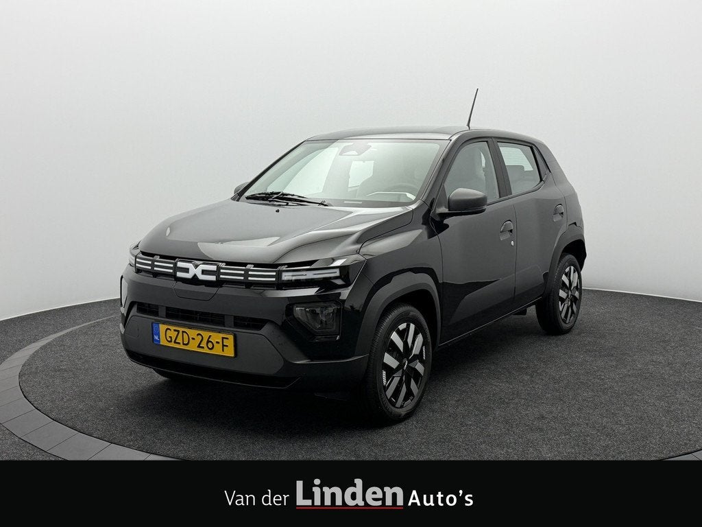 Dacia Spring Expression 65 26.8 kWh CCS SOH 96,5% | 5100 KM, Auto's, Dacia, Stof, Gebruikt, Zwart, 4 stoelen