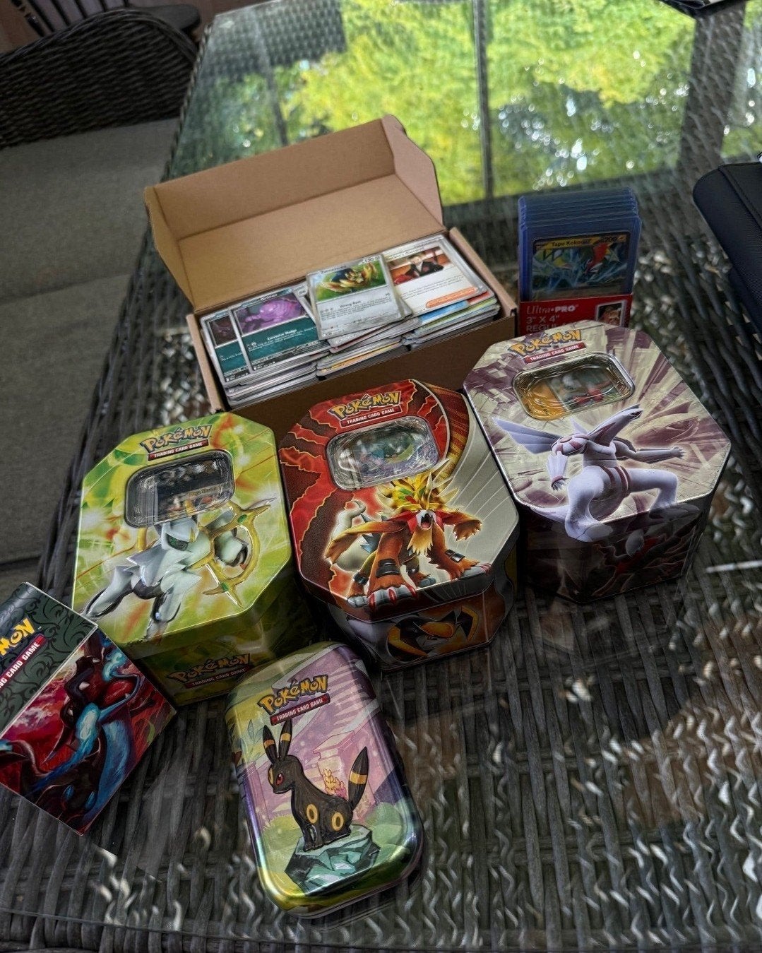 Grote collectie Pokémon kaarten met mappen en tins, Ophalen of Verzenden