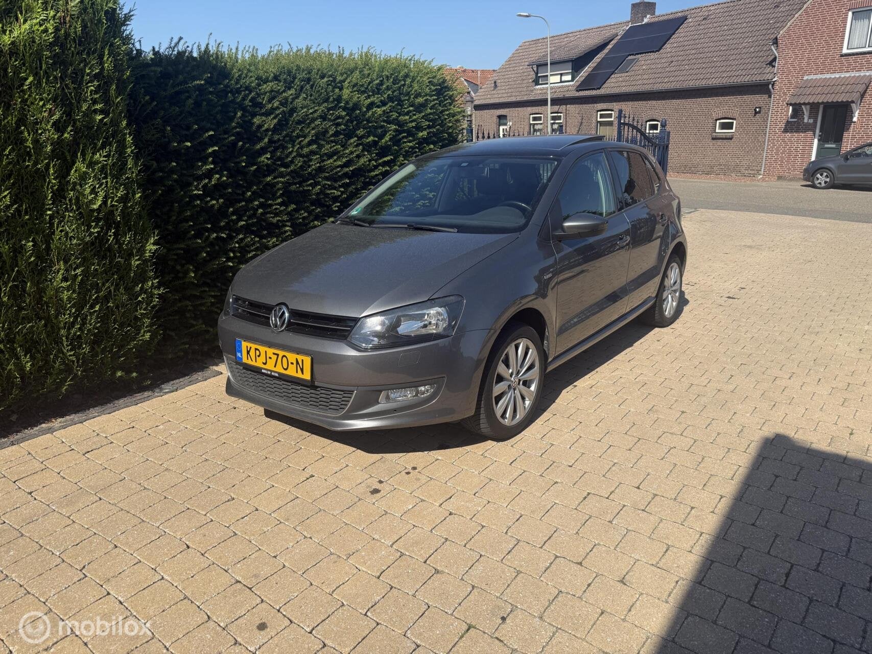 Volkswagen Polo 1.2 MET NIEUWE DSITRUBUTIE EN PANORAMADAK, Auto's, Voorwielaandrijving, Gebruikt, Zwart, 60 pk