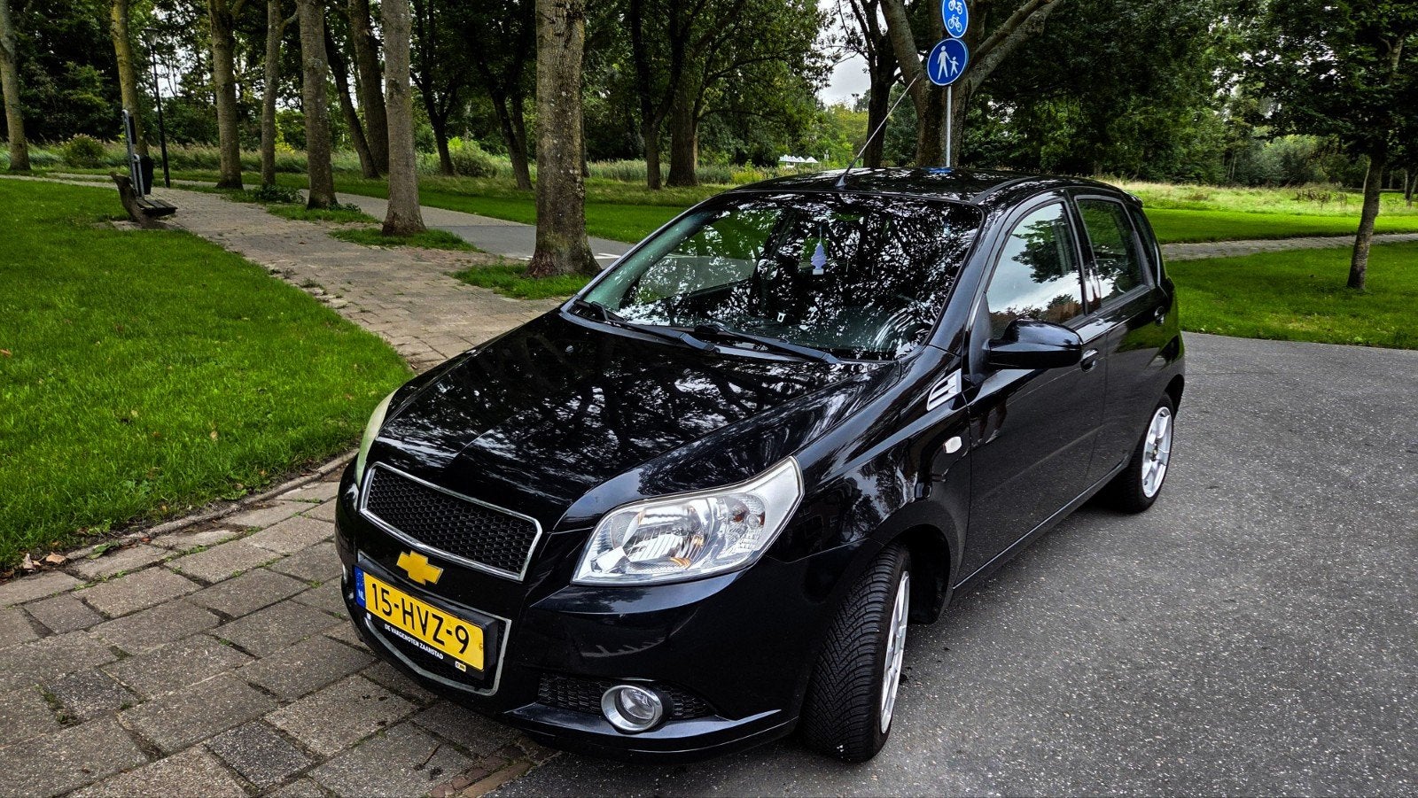 Chevrolet Aveo 1.2 16V 5D 2009 Zwart, Auto's, Voorwielaandrijving, Stof, 40 €/maand, Aveo