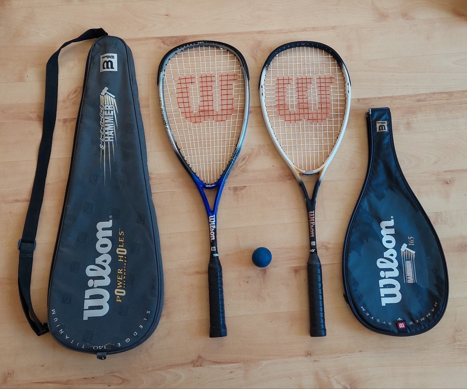 Squashrackets WILSON Hammer system Titanium, Ophalen of Verzenden, Zo goed als nieuw, Racket, Met hoes