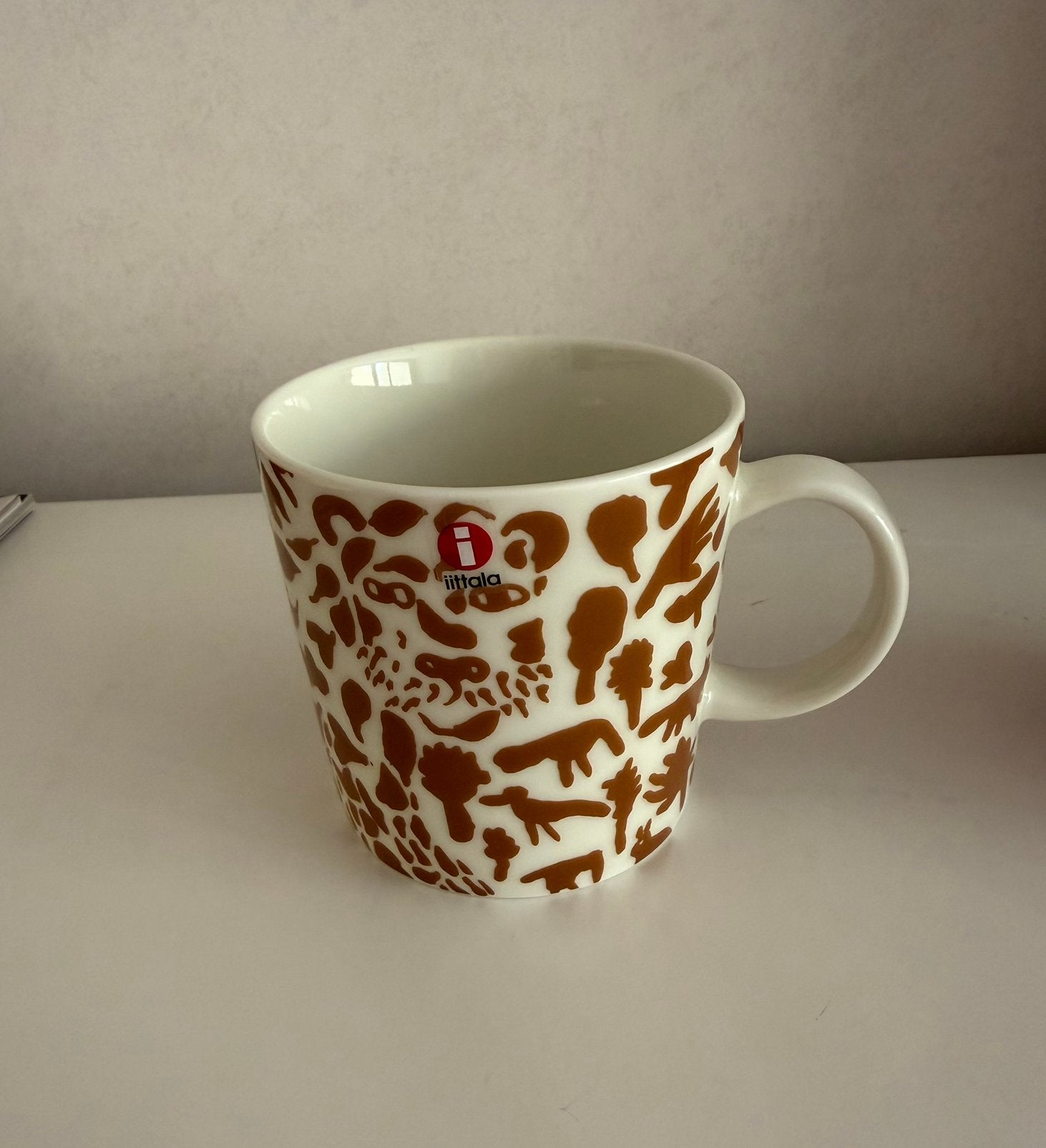 Iittala mok Cheetah, Ophalen of Verzenden, Zo goed als nieuw, Overige stijlen, Kop(pen) en/of Schotel(s)