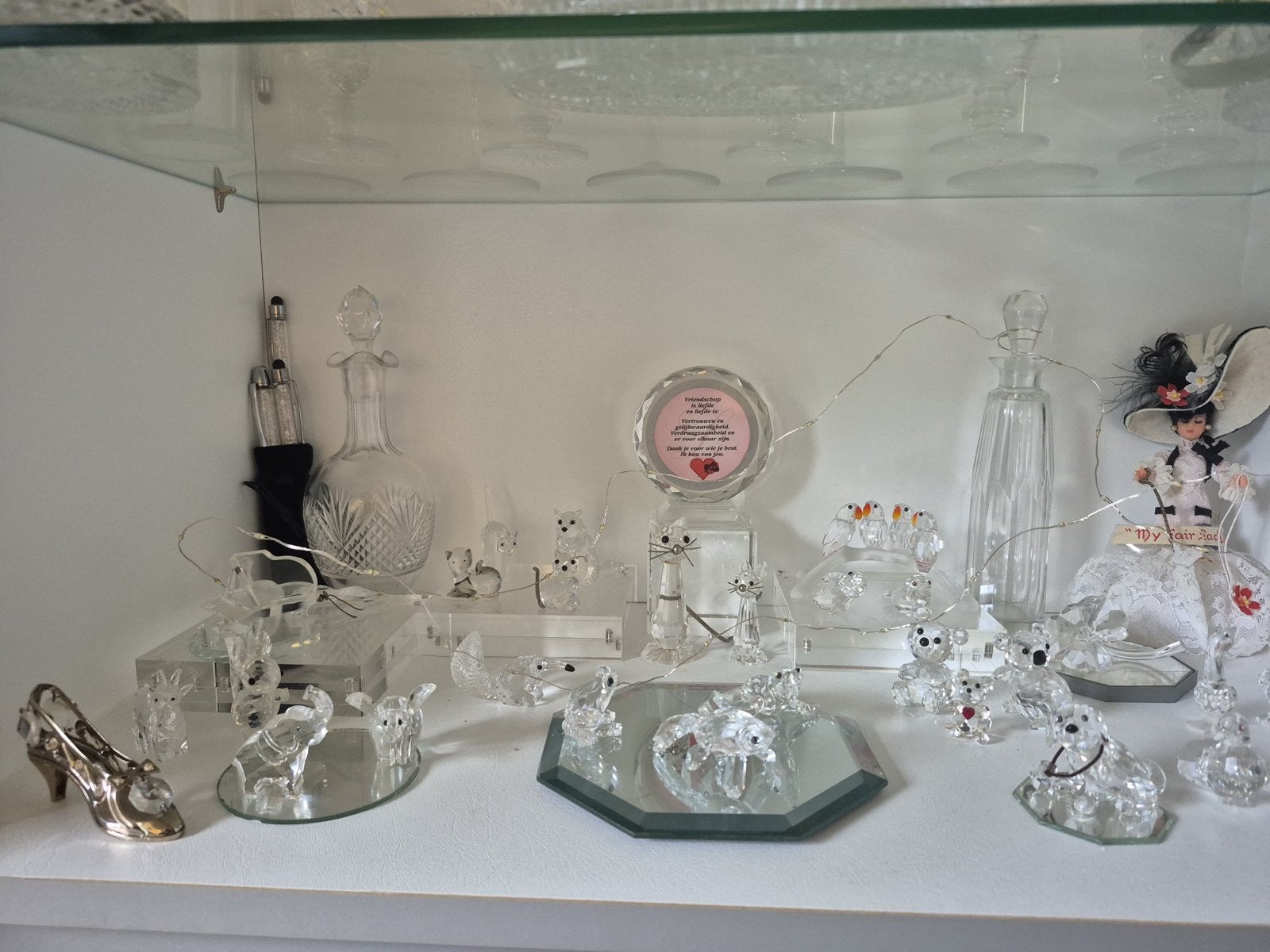 Swarovski beeldjes en pennen - per stuk of alles in één, Ophalen of Verzenden, Zo goed als nieuw, Figuurtje