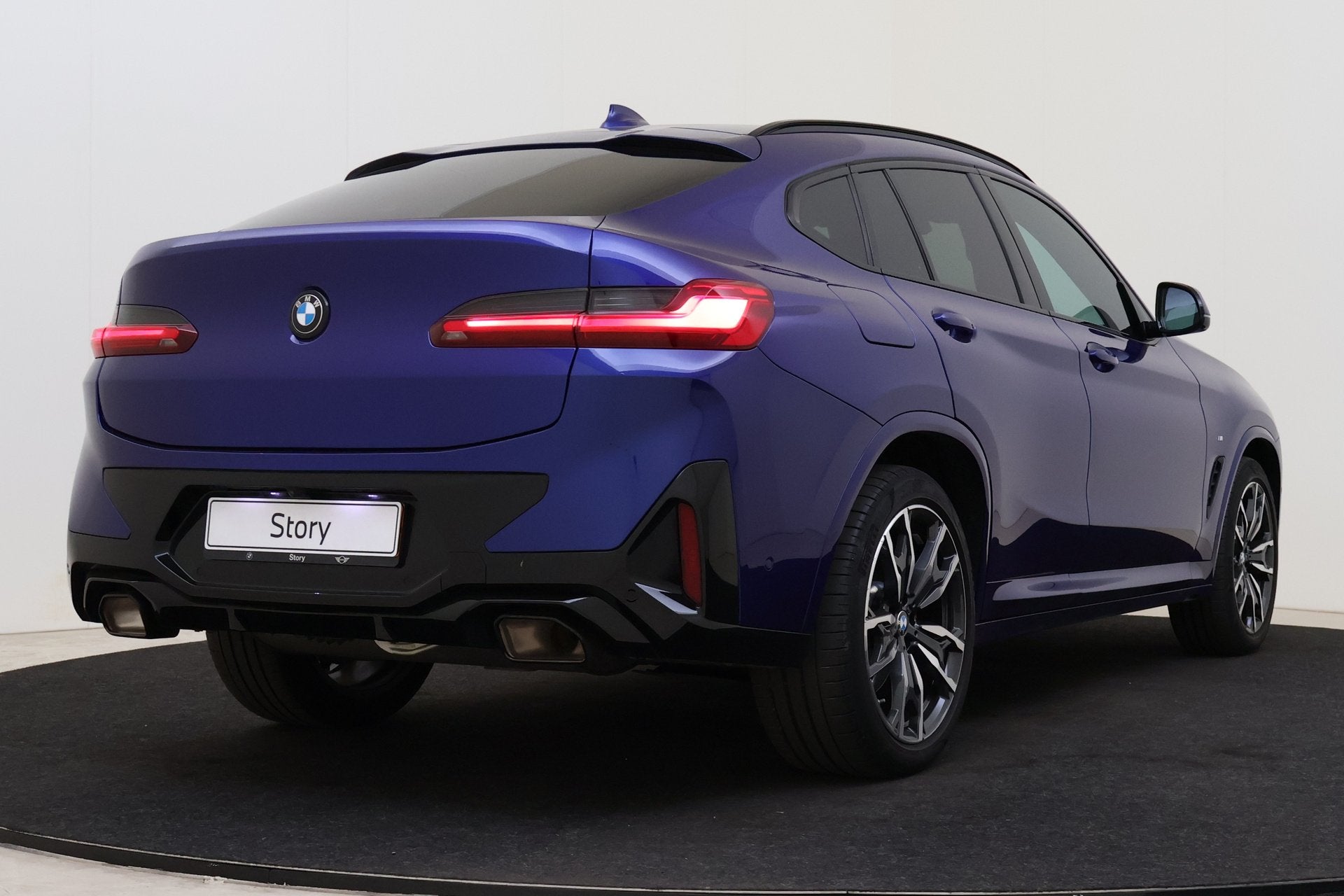BMW X4 xDrive20i High Executive M Sport Automaat / Panoramad, Auto's, Gebruikt, 4 cilinders, Met garantie (alle), Blauw