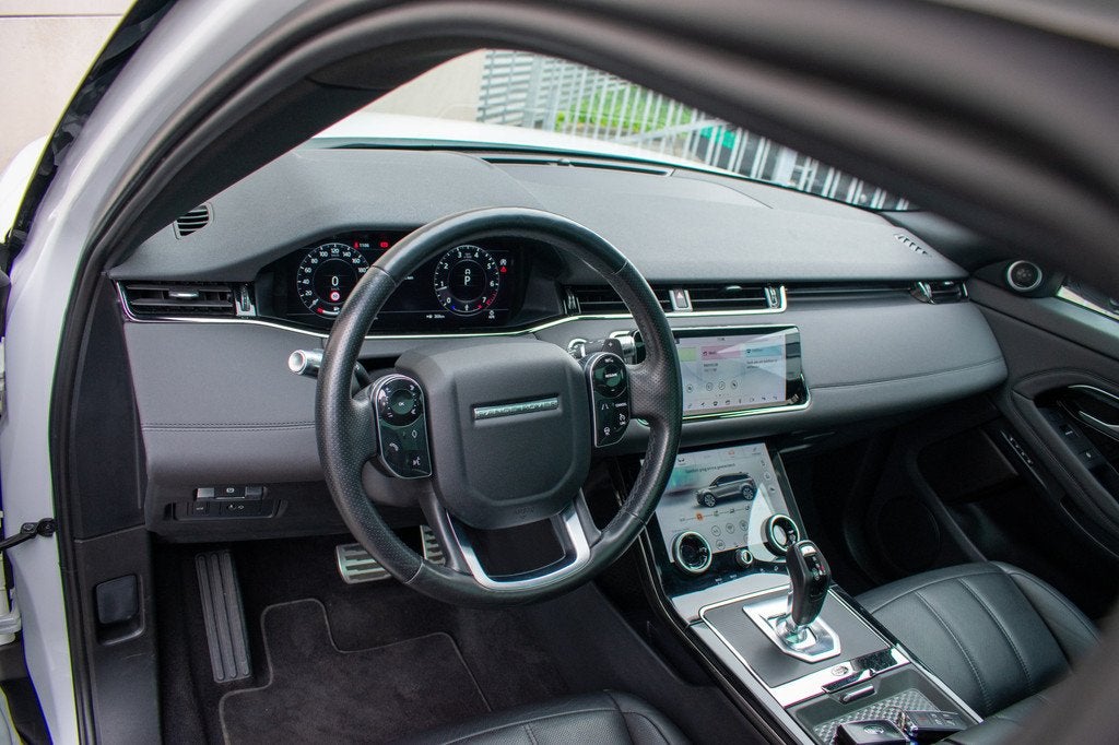 Land Rover Range Rover Evoque 2.0 P200 AWD R-Dynamic SE Pano, Auto's, Land Rover, 1800 kg, 4 cilinders, Met garantie (alle), Wit