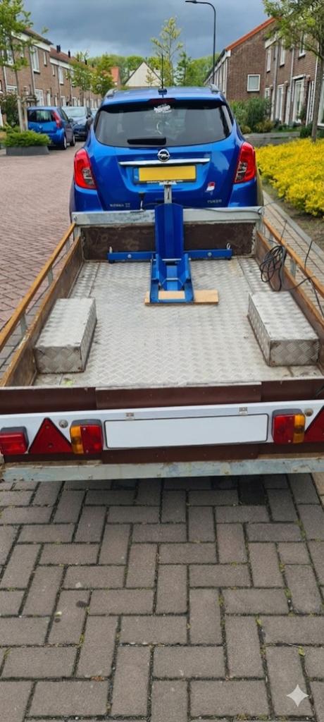 Geremde aanhanger mulifunctioneel, Ophalen