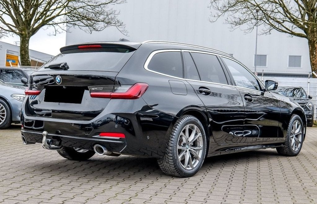 BMW 3 Serie Touring 320d 190 PK ACC Trekhaak Sportstoelen LE, Auto's, Automaat, Achterwielaandrijving, Zwart, Leder en Stof