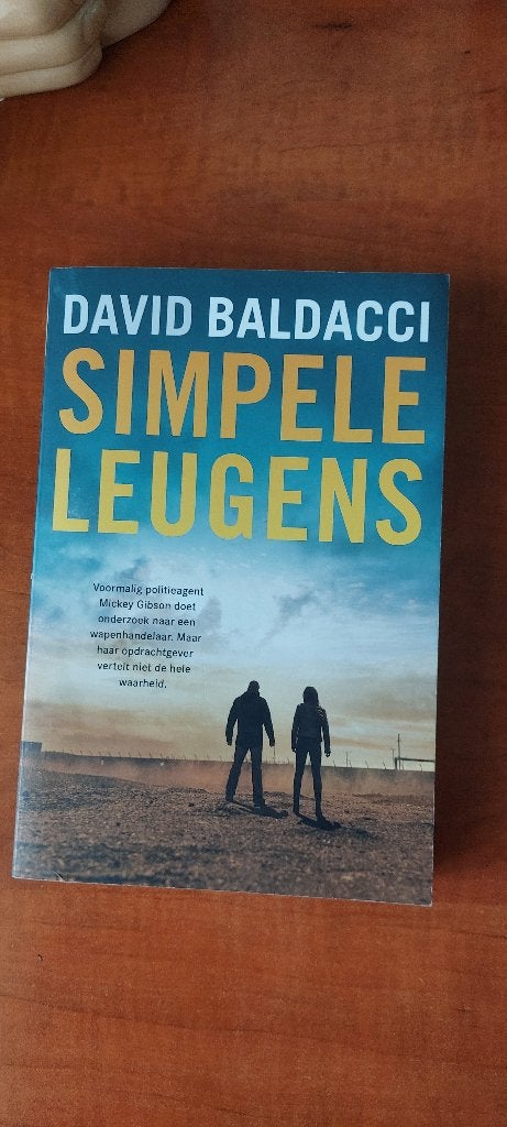 David Baldacci Simpele leugens, Ophalen of Verzenden, Zo goed als nieuw, Amerika