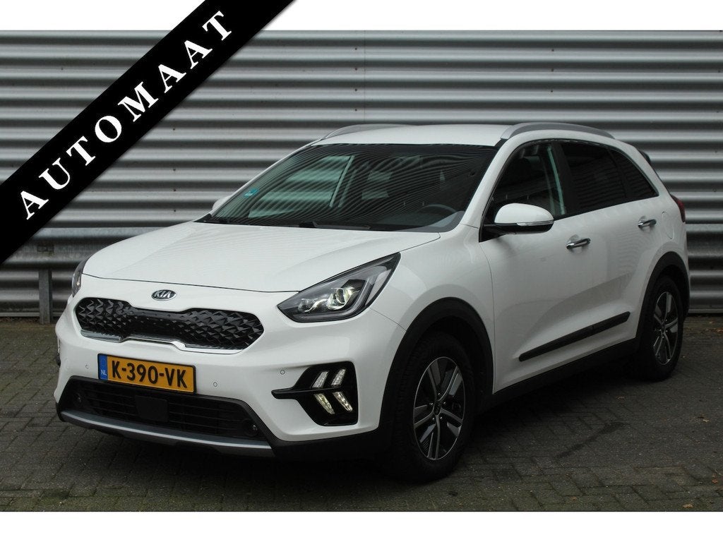Kia Niro 1.6 GDi Hybrid 141pk DynamicPlusLine Leder Trekhaak, Auto's, Kia, Gebruikt, Euro 6, Wit, Automatische klimaatregeling
