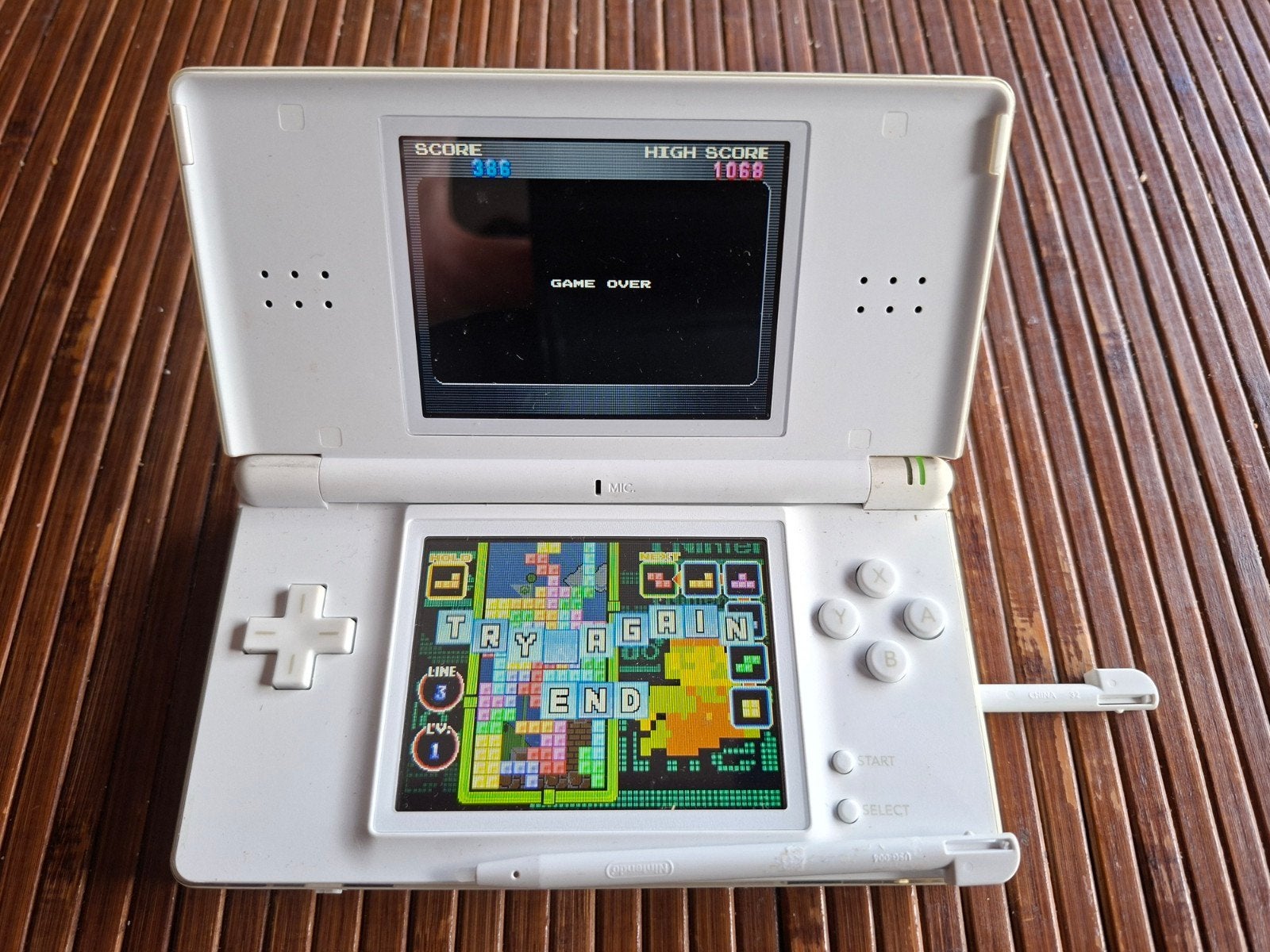 Nintendo DS Lite Wit met oplader en handleiding, Spelcomputers en Games, Ophalen of Verzenden, Gebruikt, Wit, DS Lite
