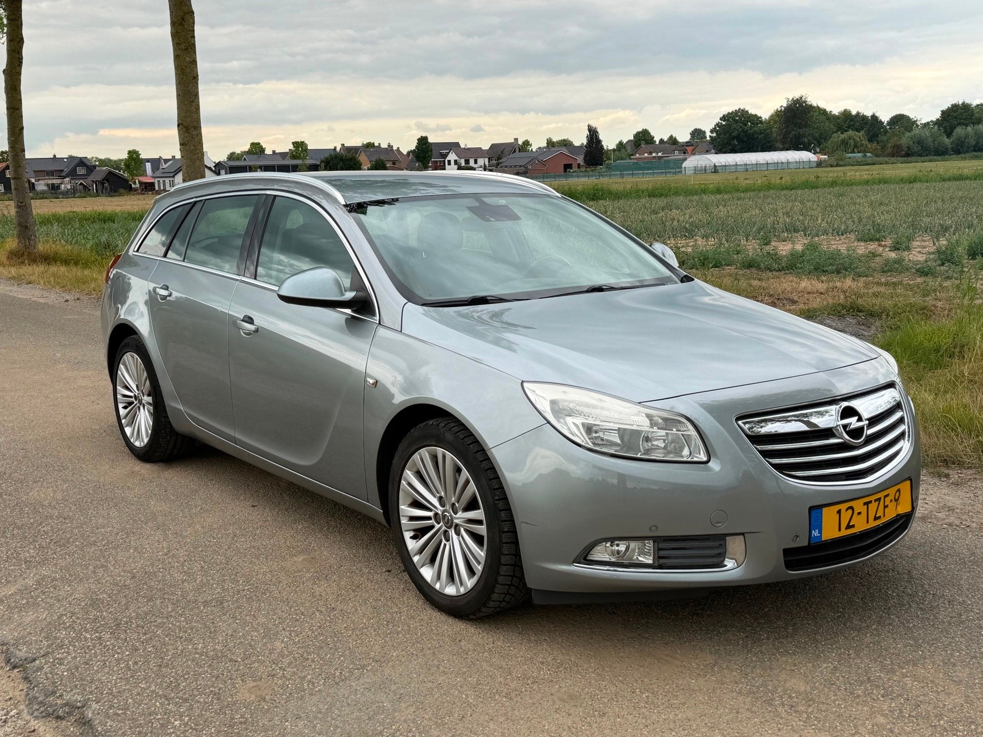 Opel Insignia Sports Tourer 1.4 Turbo EcoFLEX Business Editi, Auto's, Opel, Euro 5, Stof, Gebruikt, Zwart