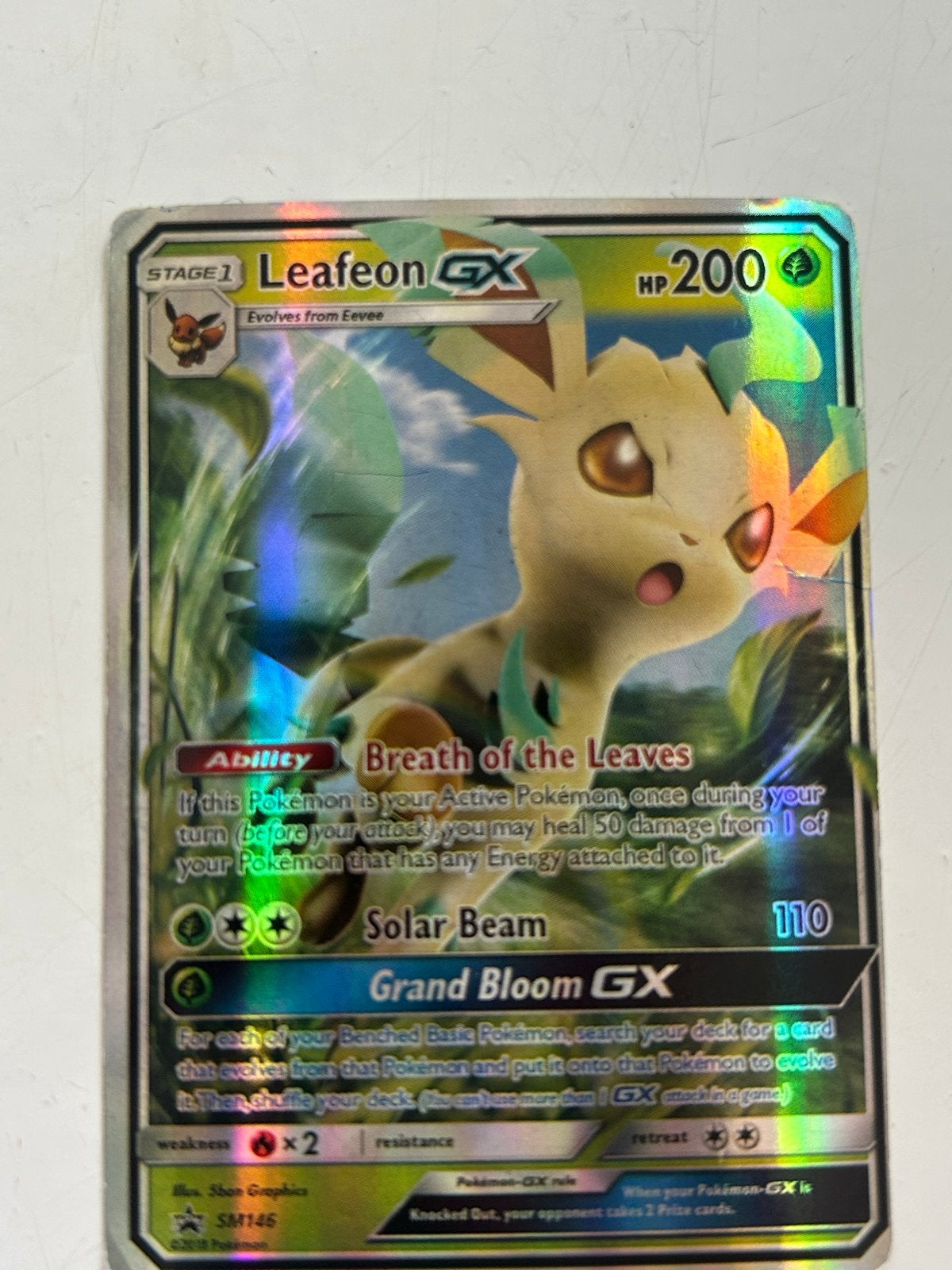 Leafeon GX Pokémon kaart - SM145 Foil, Ophalen of Verzenden, Zo goed als nieuw, Losse kaart, Foil