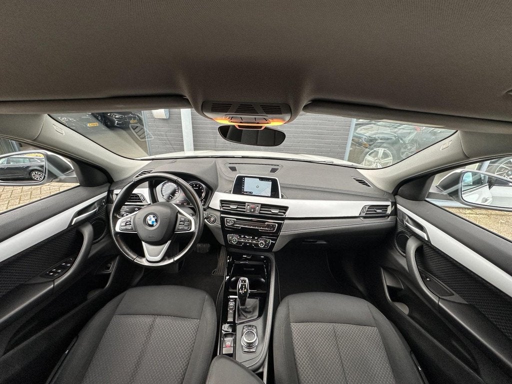 BMW X2 SDrive18i High Executive/XENON/NAVI/AUTOMAAT/NETTE ST, Auto's, BMW, Euro 6, Wit, 3 cilinders, 1390 kg