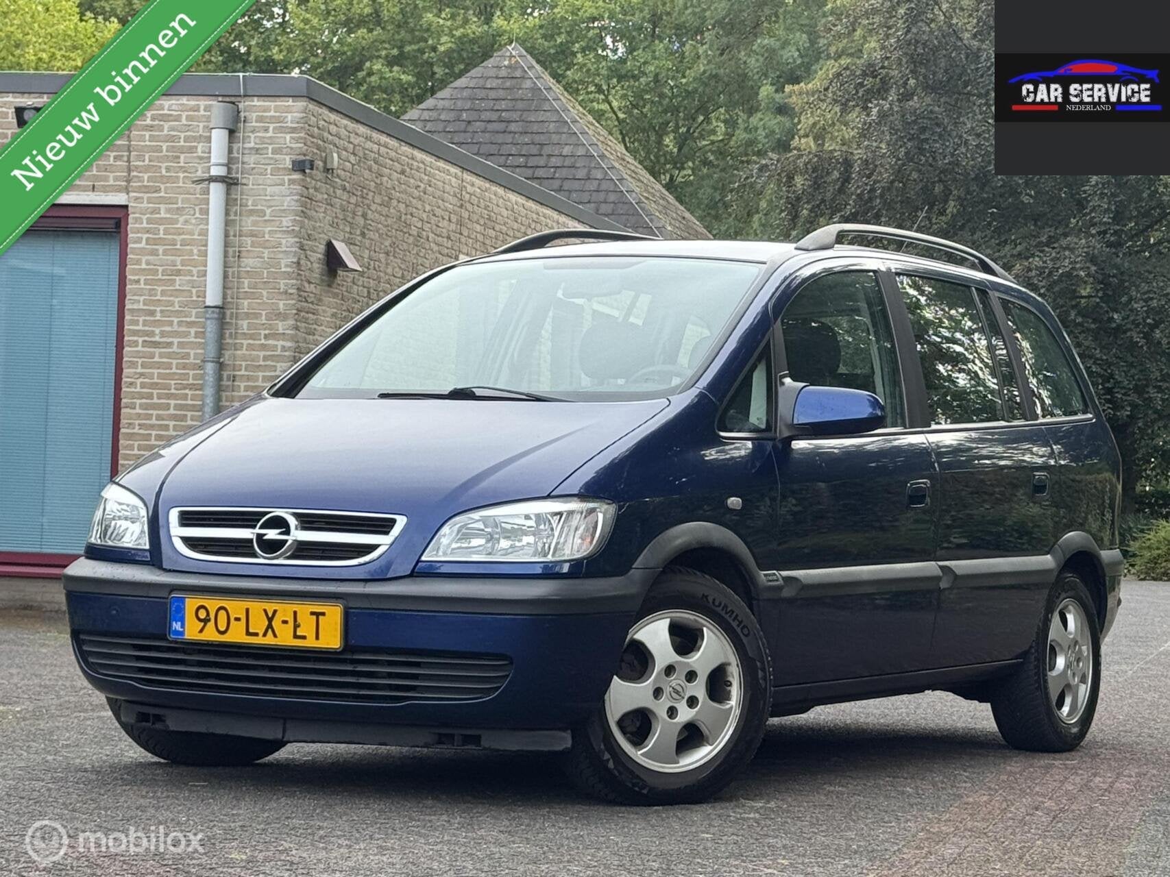 Opel Zafira 1.6-16V Comfort 7 PERSOONS/NAP/APK/LMV/TREKHAAK/, Auto's, Gebruikt, 4 cilinders, Blauw, 7 stoelen