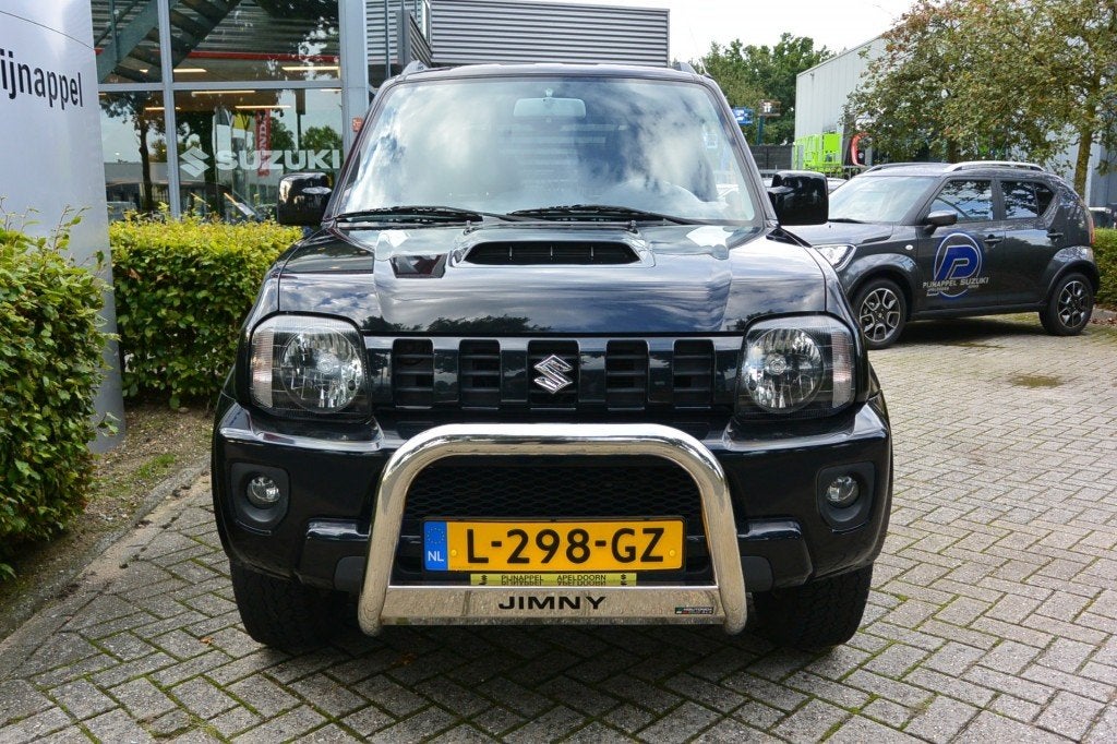 Suzuki JIMNY 1.3 Exclusive 4x4 Leder/Airco/Sidebars/Pushbar/, Auto's, Euro 5, 86 pk, Met garantie (alle), 4 stoelen