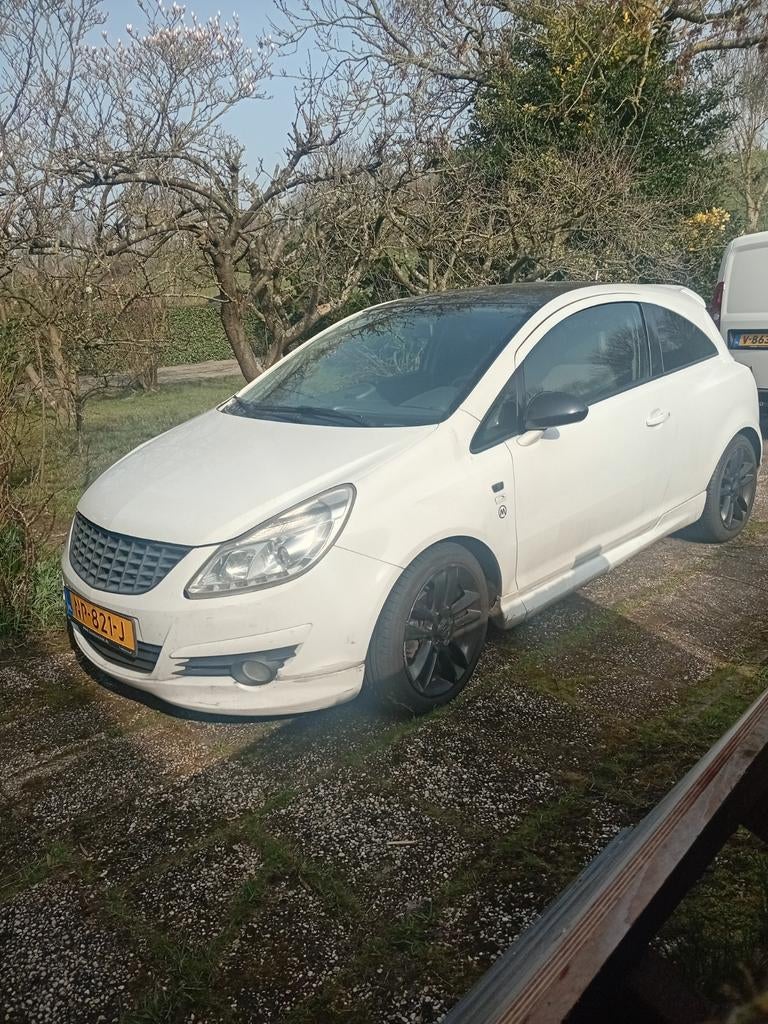 Opel Corsa 1.2 16V 3D 2008 Wit, Auto's, Voorwielaandrijving, 450 kg, 40 €/maand, Zwart