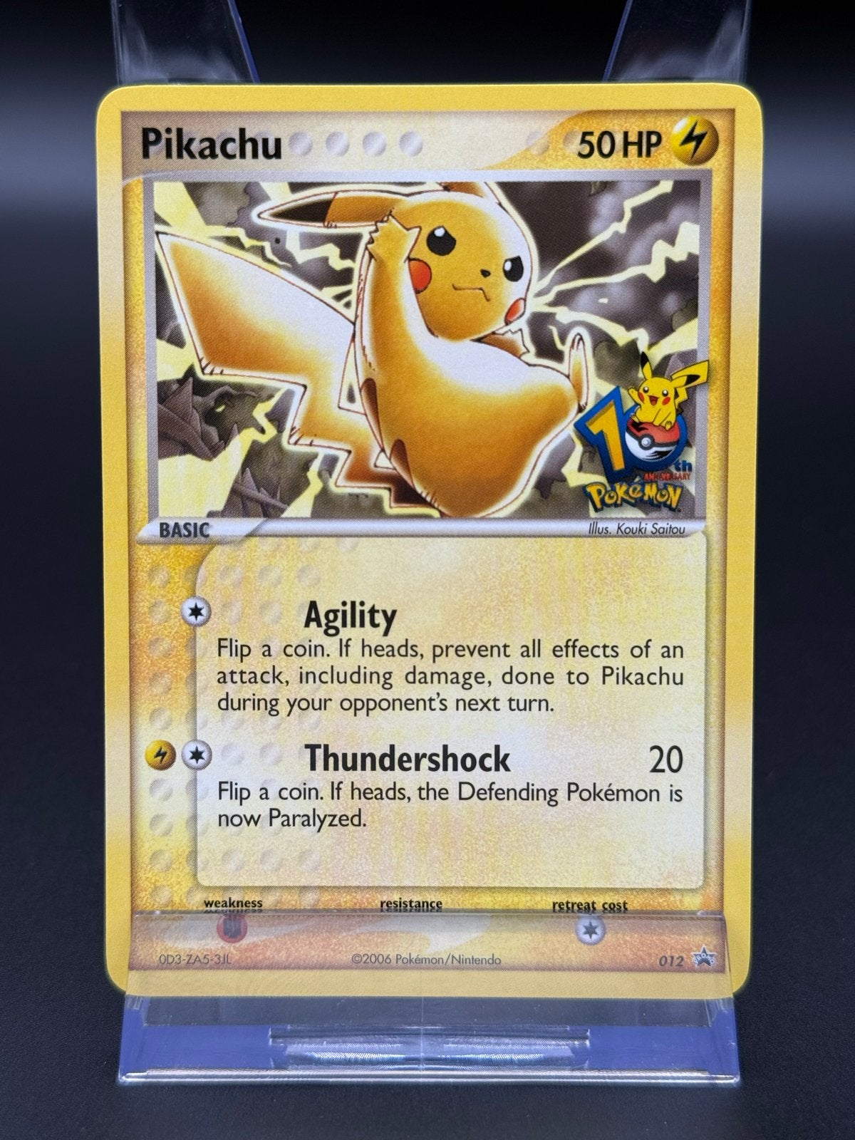 Pikachu Black Star Promo 10th Anniversary #012, Ophalen of Verzenden, Zo goed als nieuw, Losse kaart, Foil