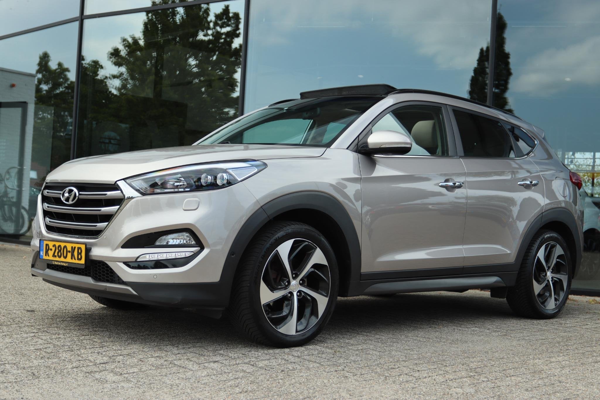 HYUNDAI TUCSON 1.6 T-GDi PREMIUM 4WD AUT. | PANO | CAMERA |, Gebruikt, 4 cilinders, Leder, Vierwielaandrijving