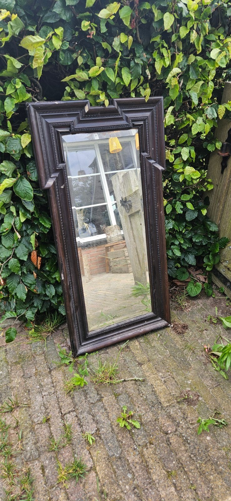 Antieke spiegel 52x100cm met donker houten lijst, Antiek en Kunst, Ophalen