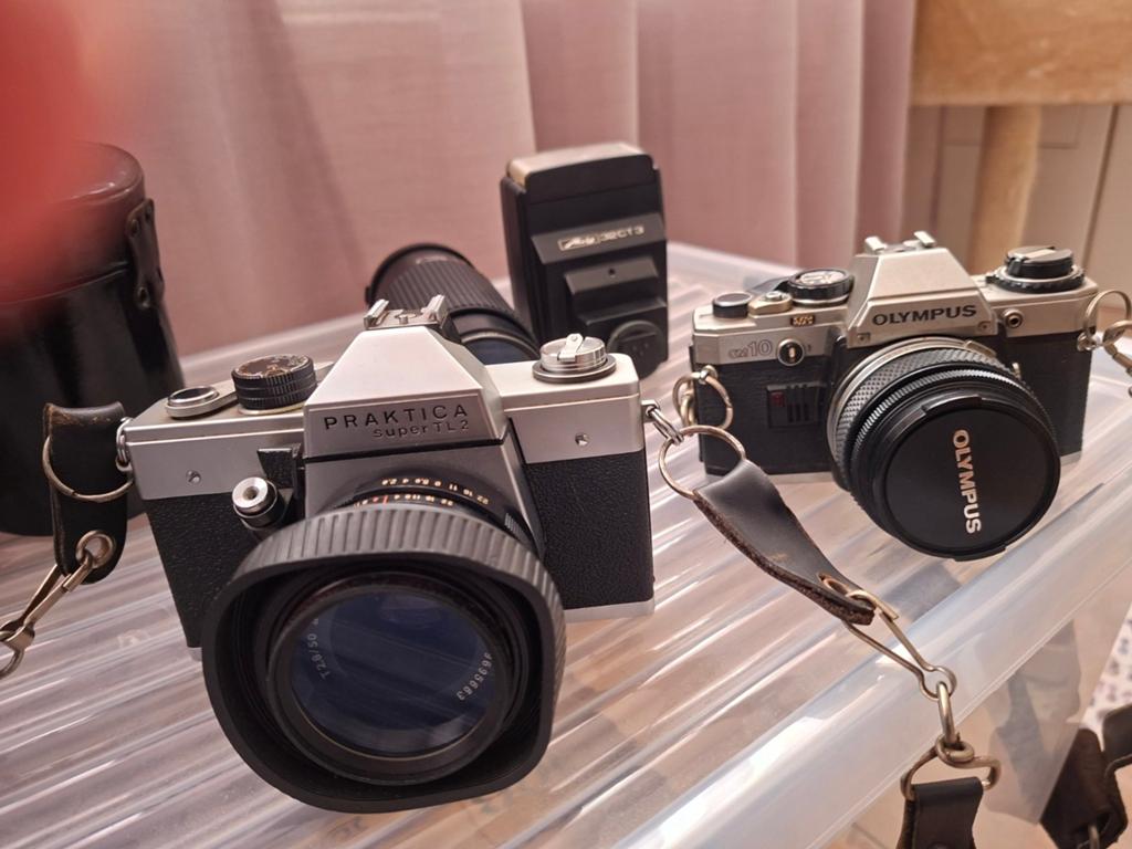 Vintage Fotografie Set: Praktica SuperTL2 & Olympus OM10, Audio, Tv en Foto, Fotocamera's Analoog, Ophalen of Verzenden, Gebruikt