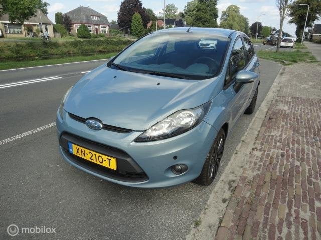 Ford Fiesta 1.25 Ghia nwe apk, Voorwielaandrijving, 1242 cc, 4 cilinders, Elektrische ramen