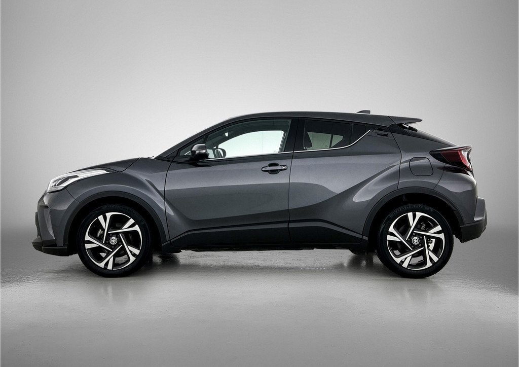 Toyota C-HR 1.8 Hybrid Dynamic | Dealeronderhouden | Blind s, 12 maanden, Euro 6, 4 cilinders, Automatische klimaatregeling