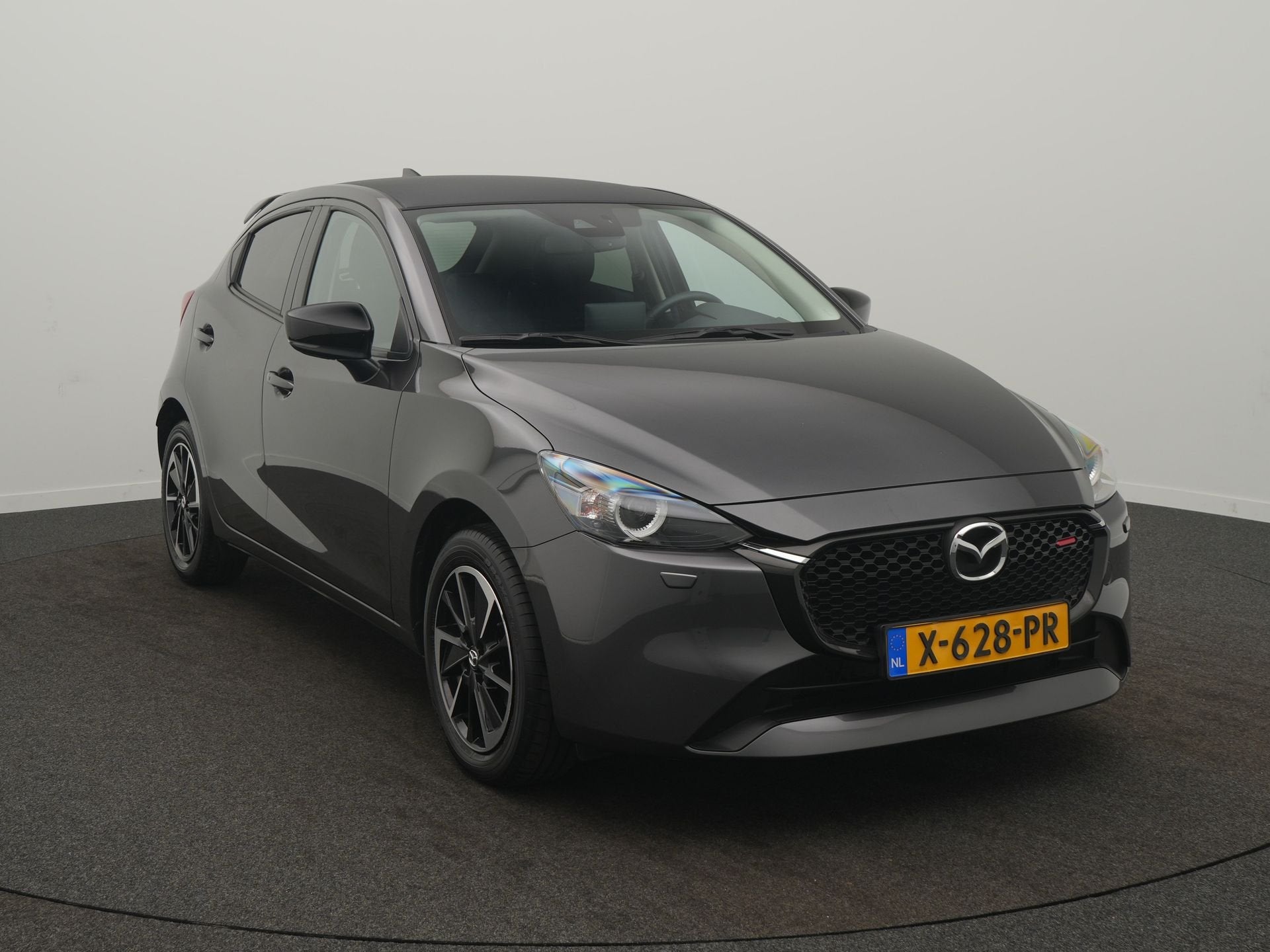 Mazda 2 1.5 e-SkyActiv-G 90 Homura Aka - RIJKLAARPRIJS - Zel, Auto's, 12 maanden, Automatische klimaatregeling, 4 cilinders, Leder en Stof
