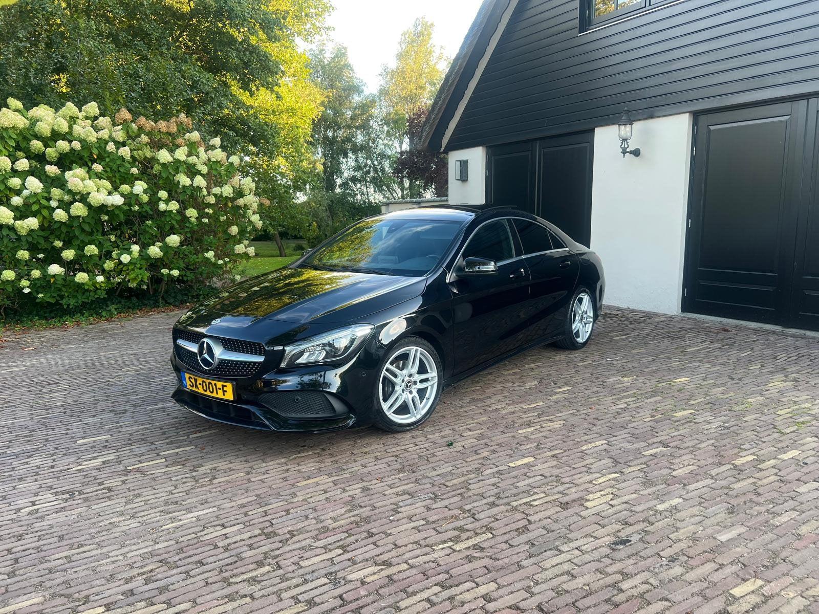 Mercedes-Benz CLA 180 AMG Line 7G-DCT Camera | Navi |  | NL, Zwart, 4 cilinders, 715 kg, 1200 kg