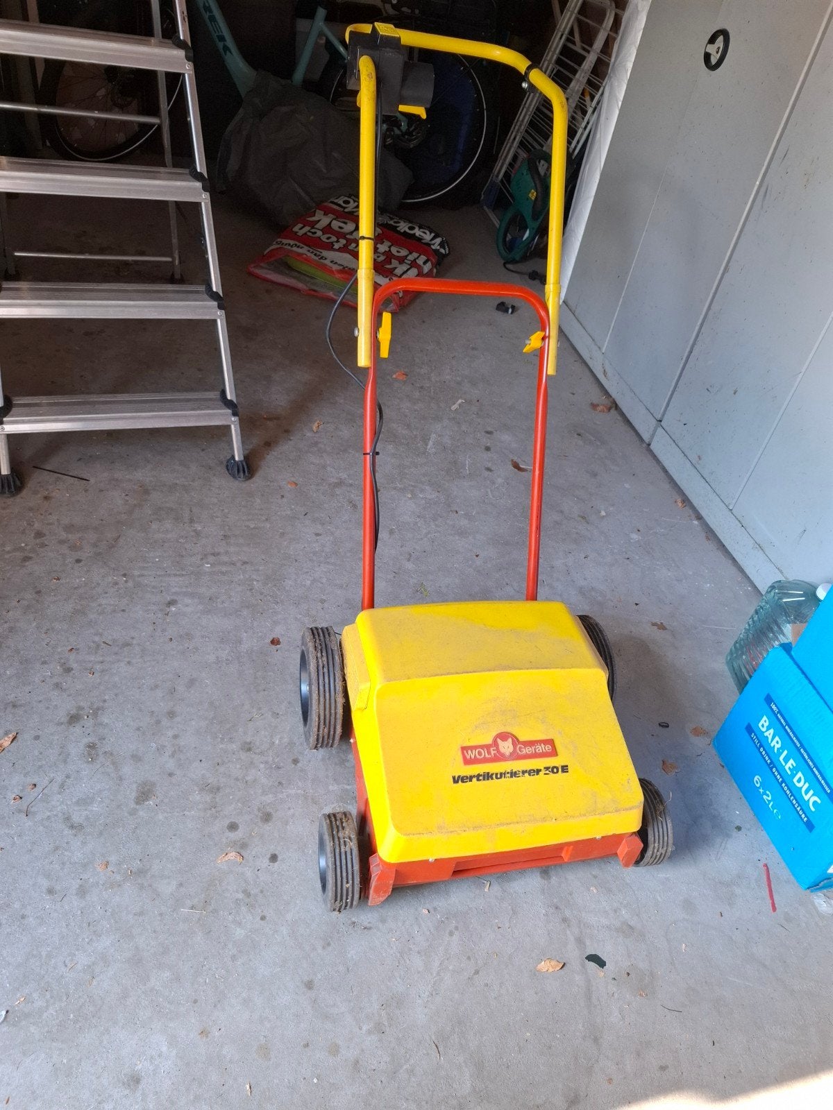 verticuteermachine, Ophalen, Elektrisch