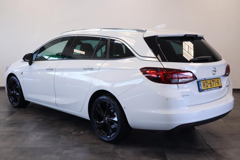 Opel Astra Sports Tourer 1.4 Innovation Schuifdak Navigatie, Auto's, Stof, Gebruikt, 150 pk, Wit