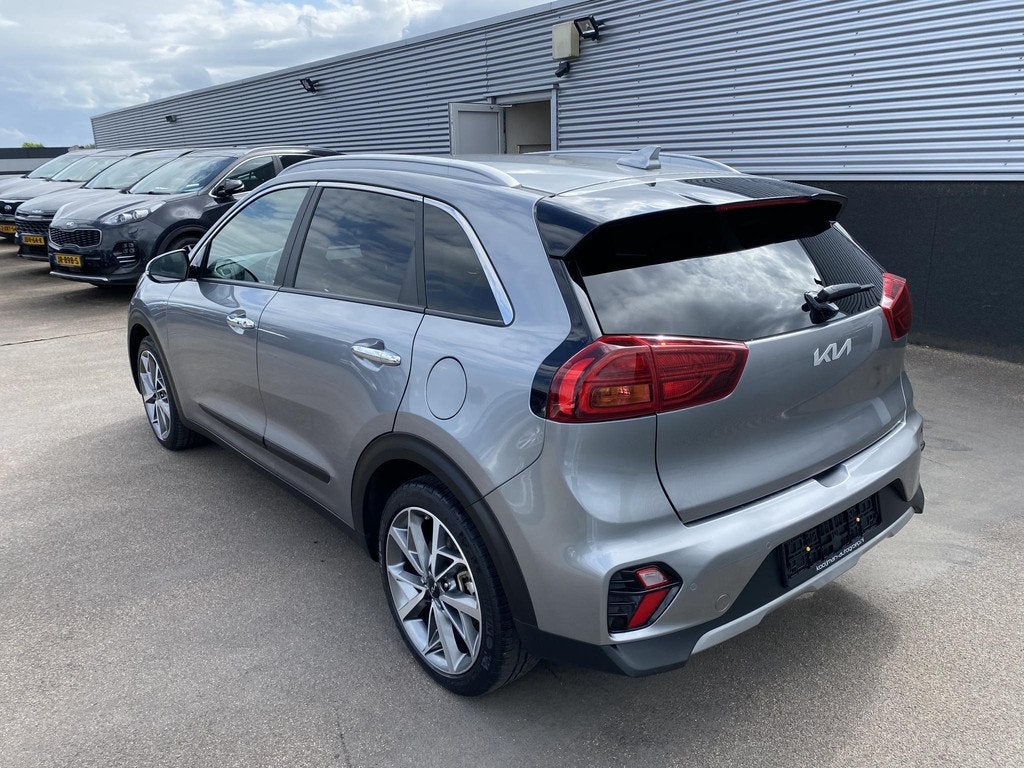 Kia Niro 1.6 GDi Hybrid DynamicLine Plus Navigatie, Achterui, Auto's, Kia, Gebruikt, Euro 6, Leder en Stof, 1390 kg