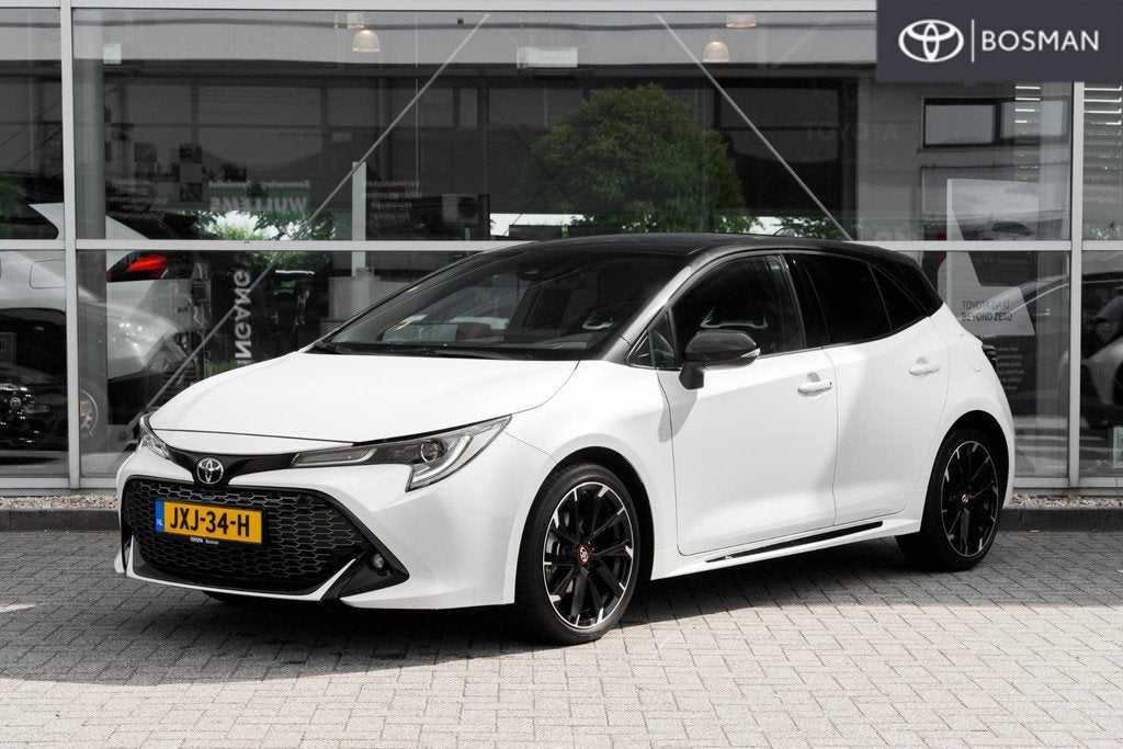Toyota Corolla Hybrid 140 GR Sport, Auto's, Toyota, 450 kg, Gebruikt, 4 cilinders, Wit