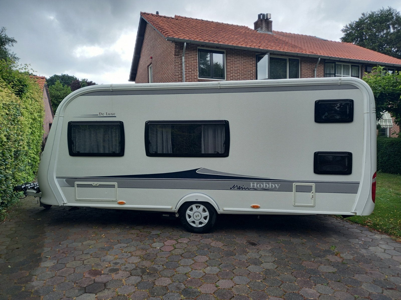 Hobby 490 KMF stapelbed 6 pers mover luifeltent fietsenrek, Schokbreker, Hobby, 7 tot 8 meter, Treinzit