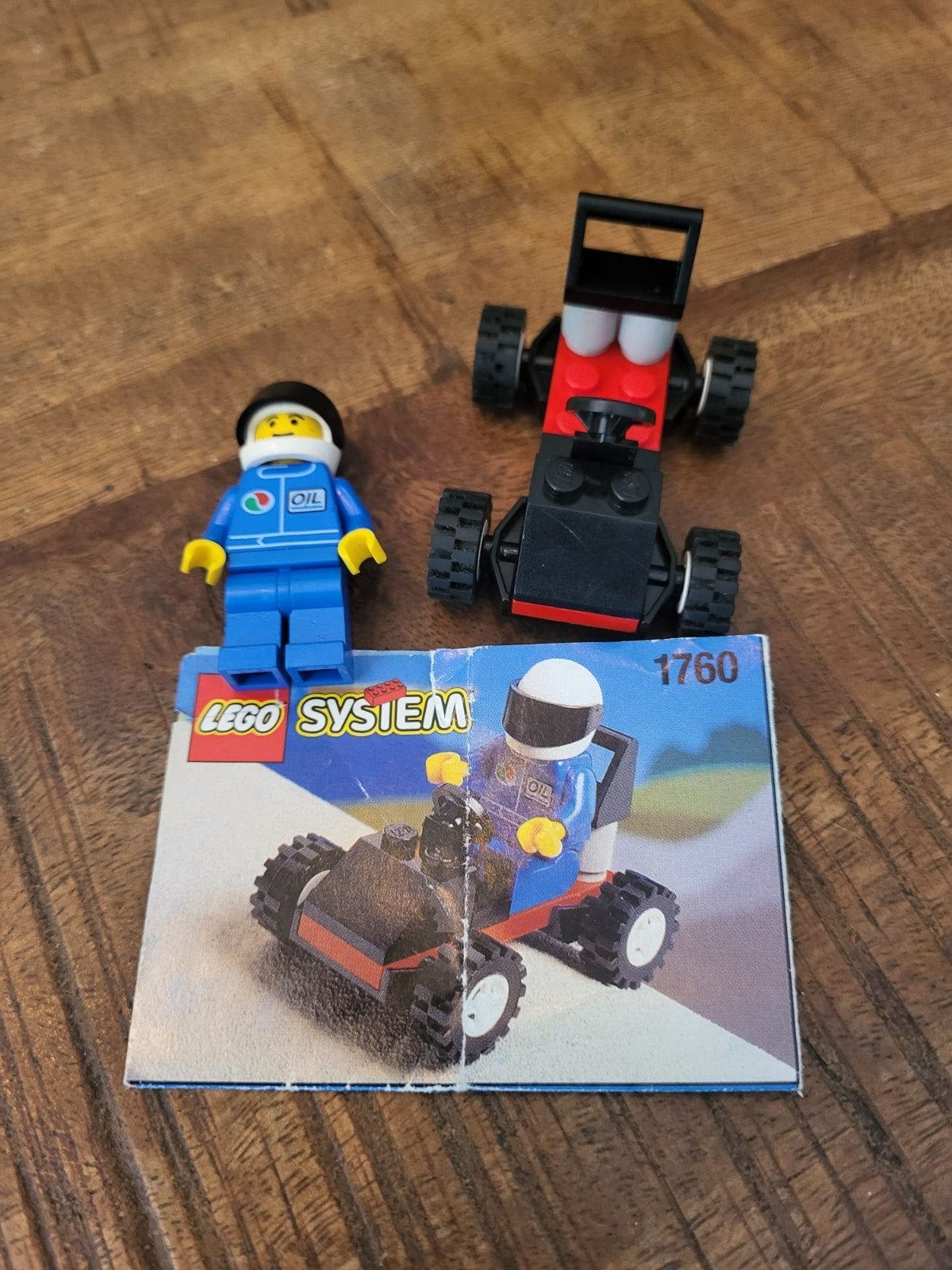 Lego System 1760 met minifiguur en raceauto, Ophalen of Verzenden