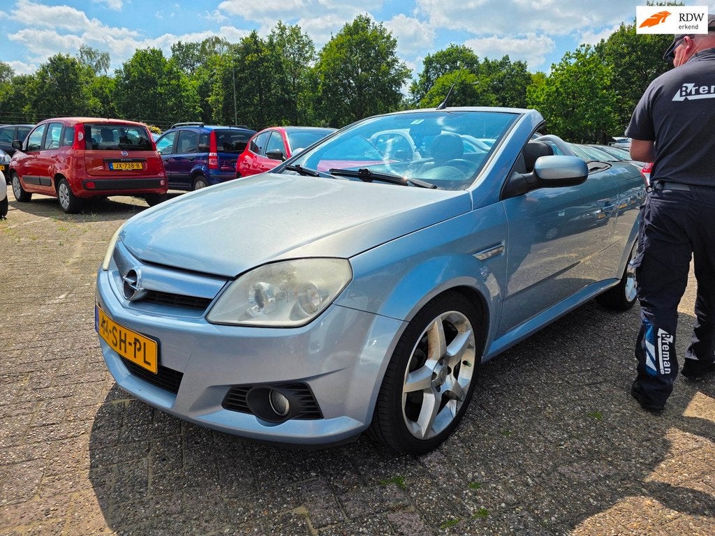 Opel Tigra TwinTop 1.8-16V Linea Rosso, Auto's, Opel, 125 pk, Gebruikt, 4 cilinders, Blauw
