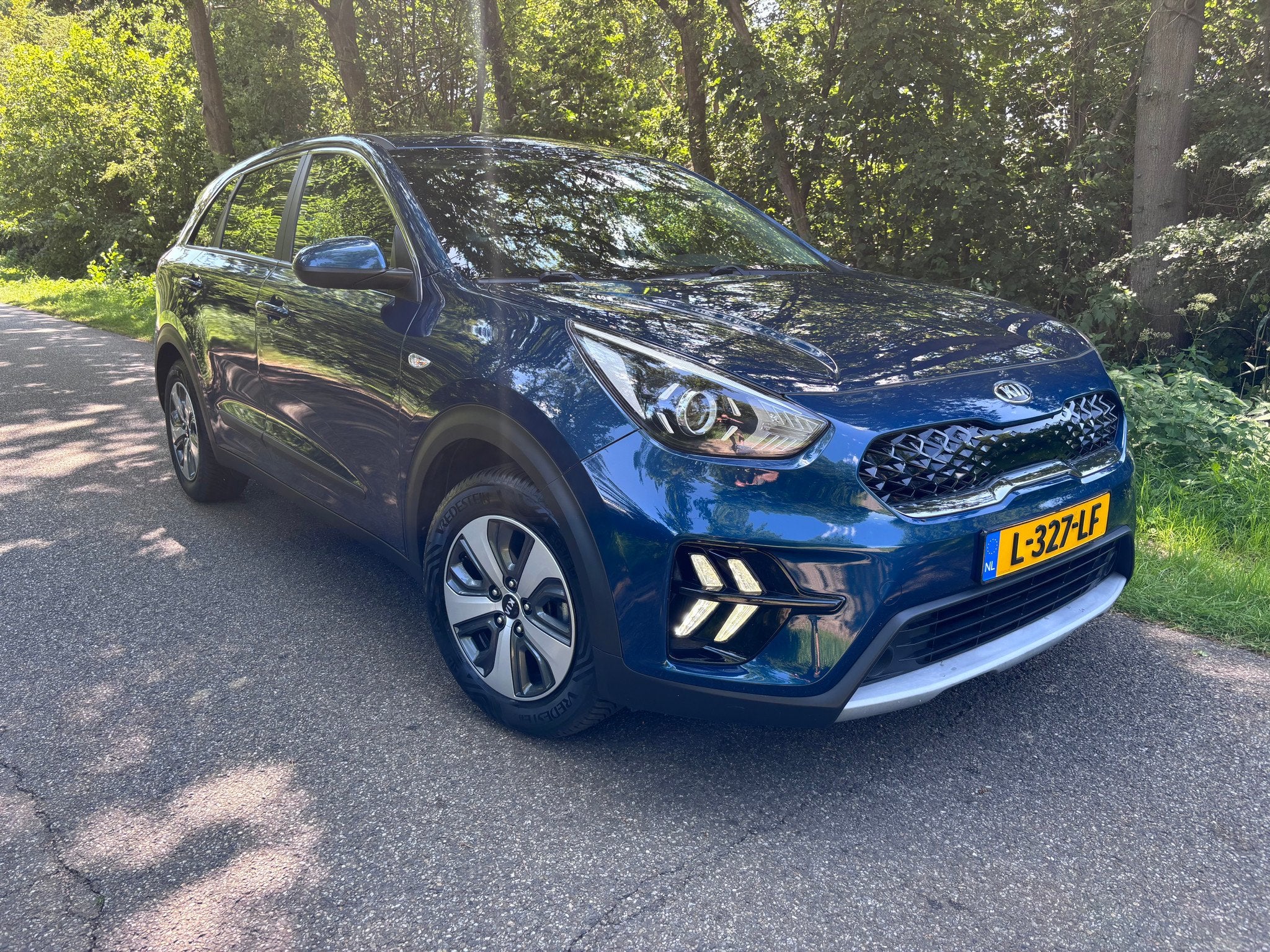 Kia Niro 1.6GDI Hybrid Comfort Line Trekhaak (bj 2021), Auto's, Gebruikt, Euro 6, Blauw, Origineel Nederlands