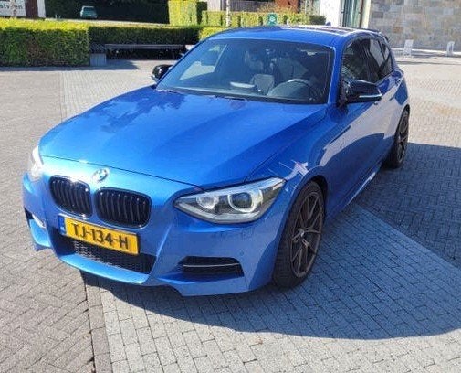 BMW M135i 5DR Xdrive AUT 2013 Estoril Blauw, Auto's, Zwart, Navigatiesysteem, Alcantara, Vierwielaandrijving