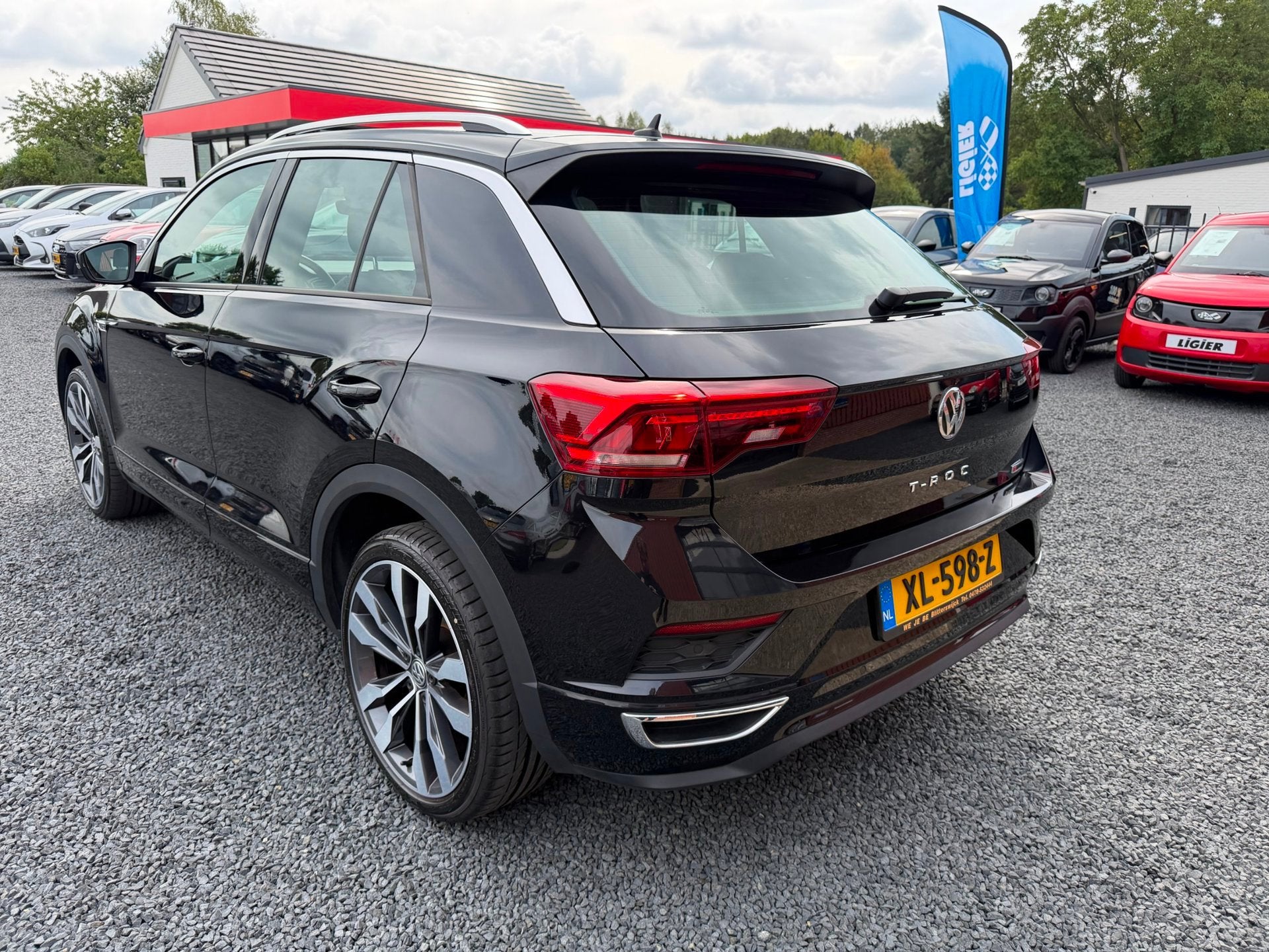 Volkswagen T-Roc 2.0 TSI 4Motion Sport Business R, Auto's, Dealer onderhouden, 15 km/l, Gebruikt, Euro 6
