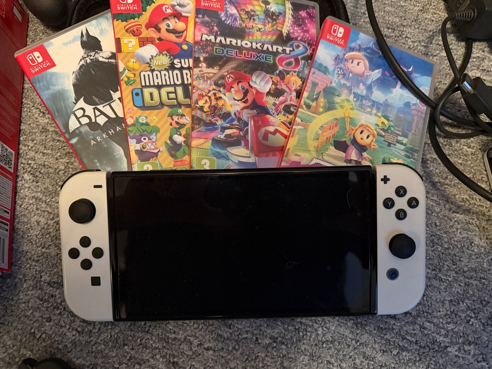 Nintendo Switch OLED met games en accessoires