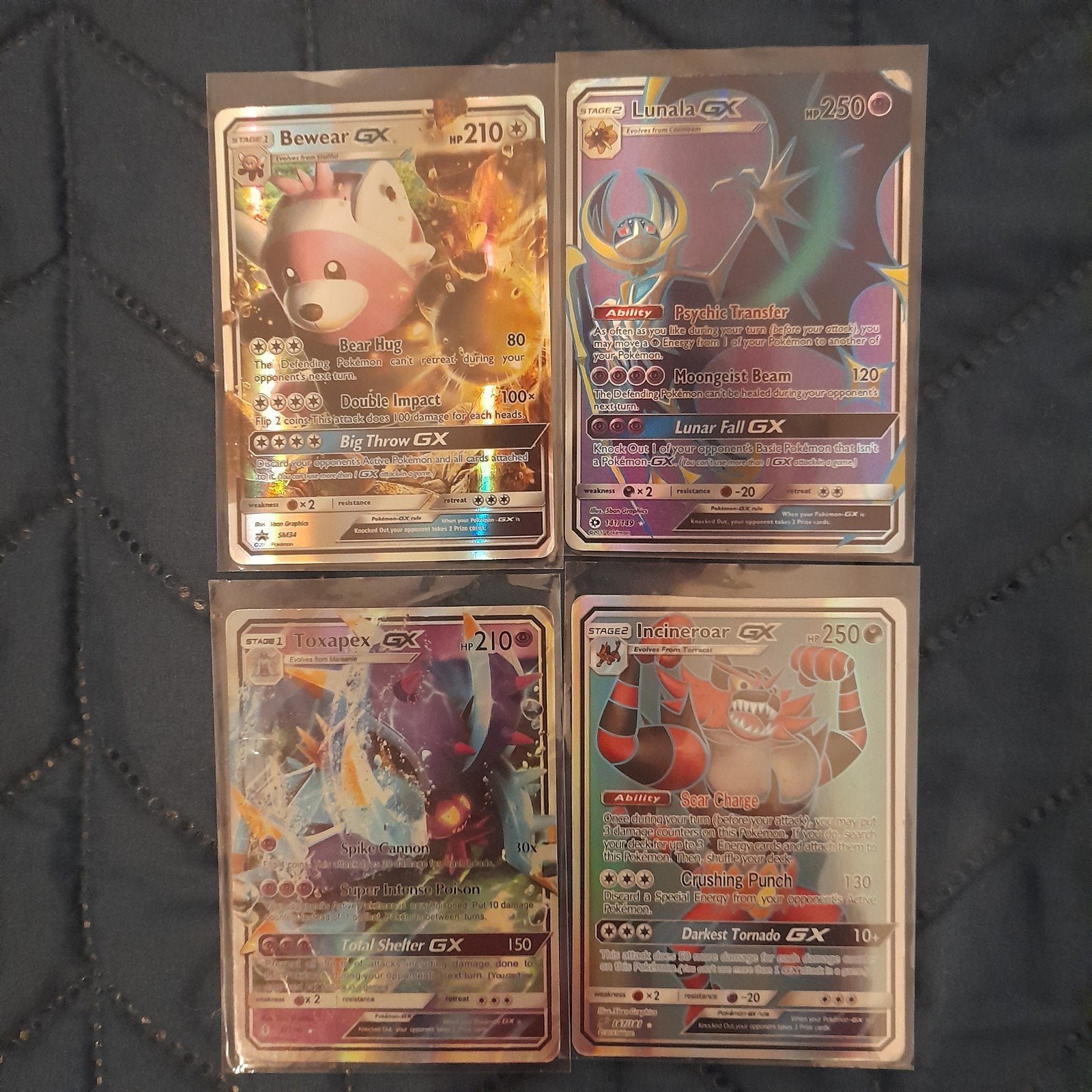 4 Pokémon GX kaarten - Bewear, Lunala, Toxapex, Incineroar, Ophalen of Verzenden, Zo goed als nieuw, Meerdere kaarten, Foil