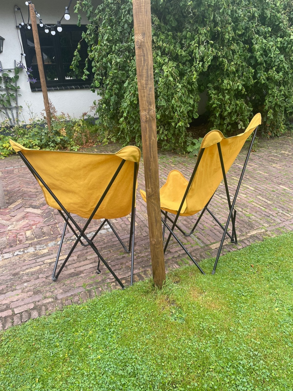 Twee Lafuma opvouwbare vlinderstoelen geel met zwart frame., Ophalen, Zo goed als nieuw, Campingstoel