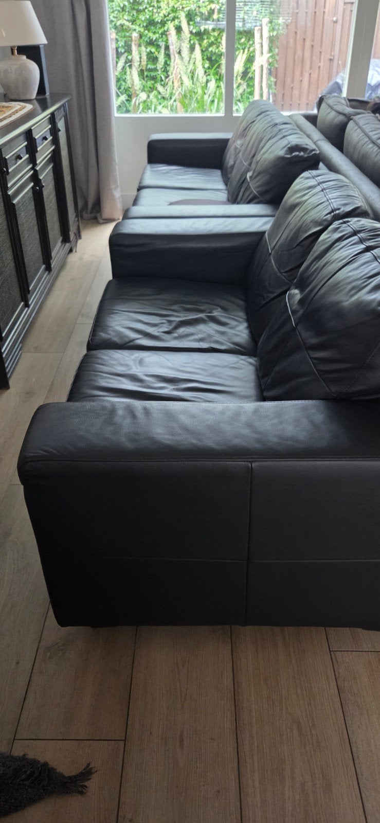 Zwarte leren hoekbank in goede staat, 250 tot 300 cm, Gebruikt, 100 tot 125 cm, Hoekbank