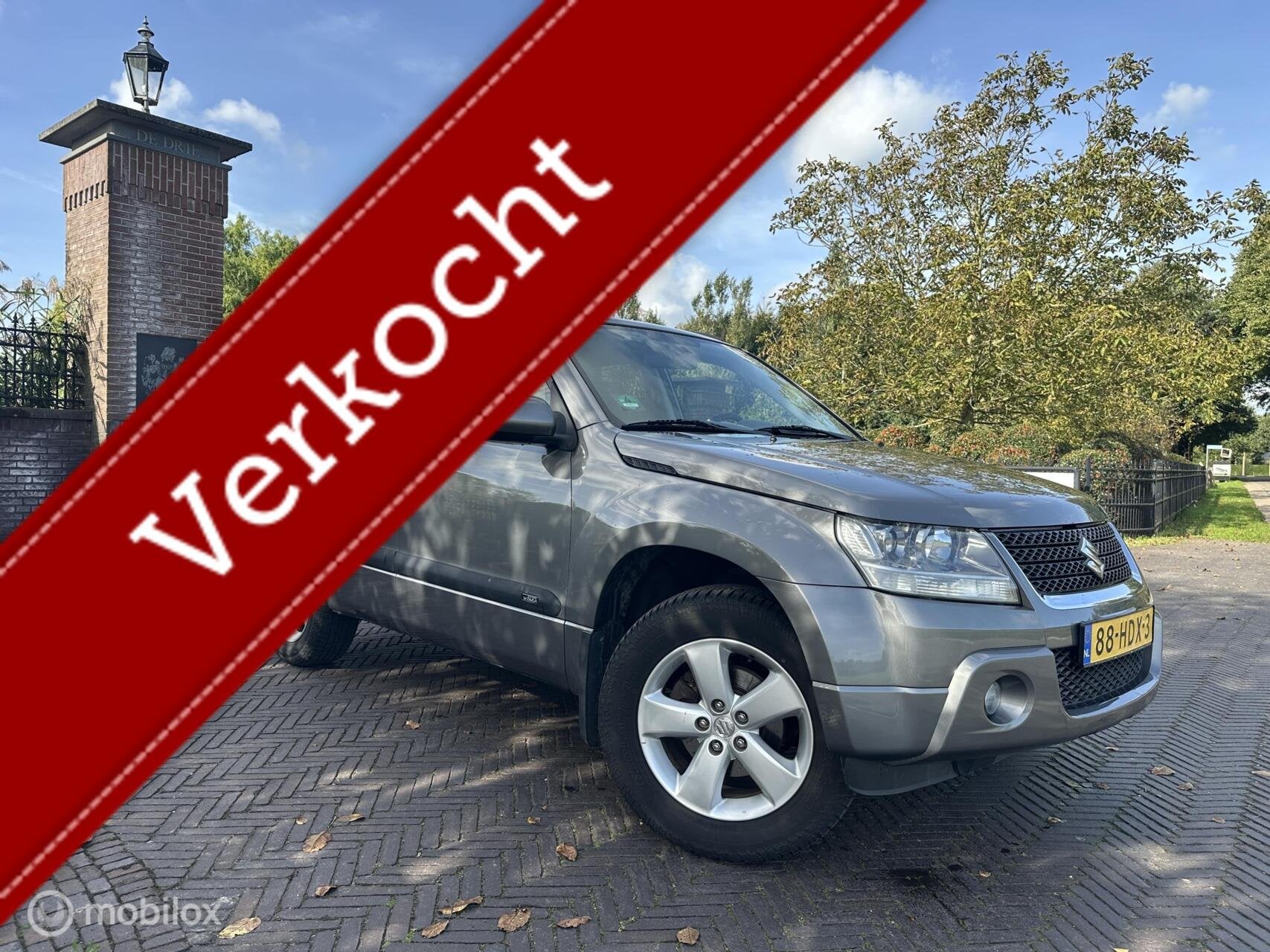 Suzuki Grand Vitara 2.4 Exclusive 4x4 Trekhaak Cruise✅, Stof, Gebruikt, Zwart, 4 cilinders