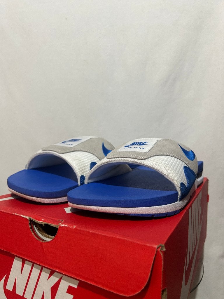 ALS NIEUW + DOOS Maat 49,5 - Nike Air Max 1 Slide Royal Blue, Slippers, Nike, Zo goed als nieuw, Nike