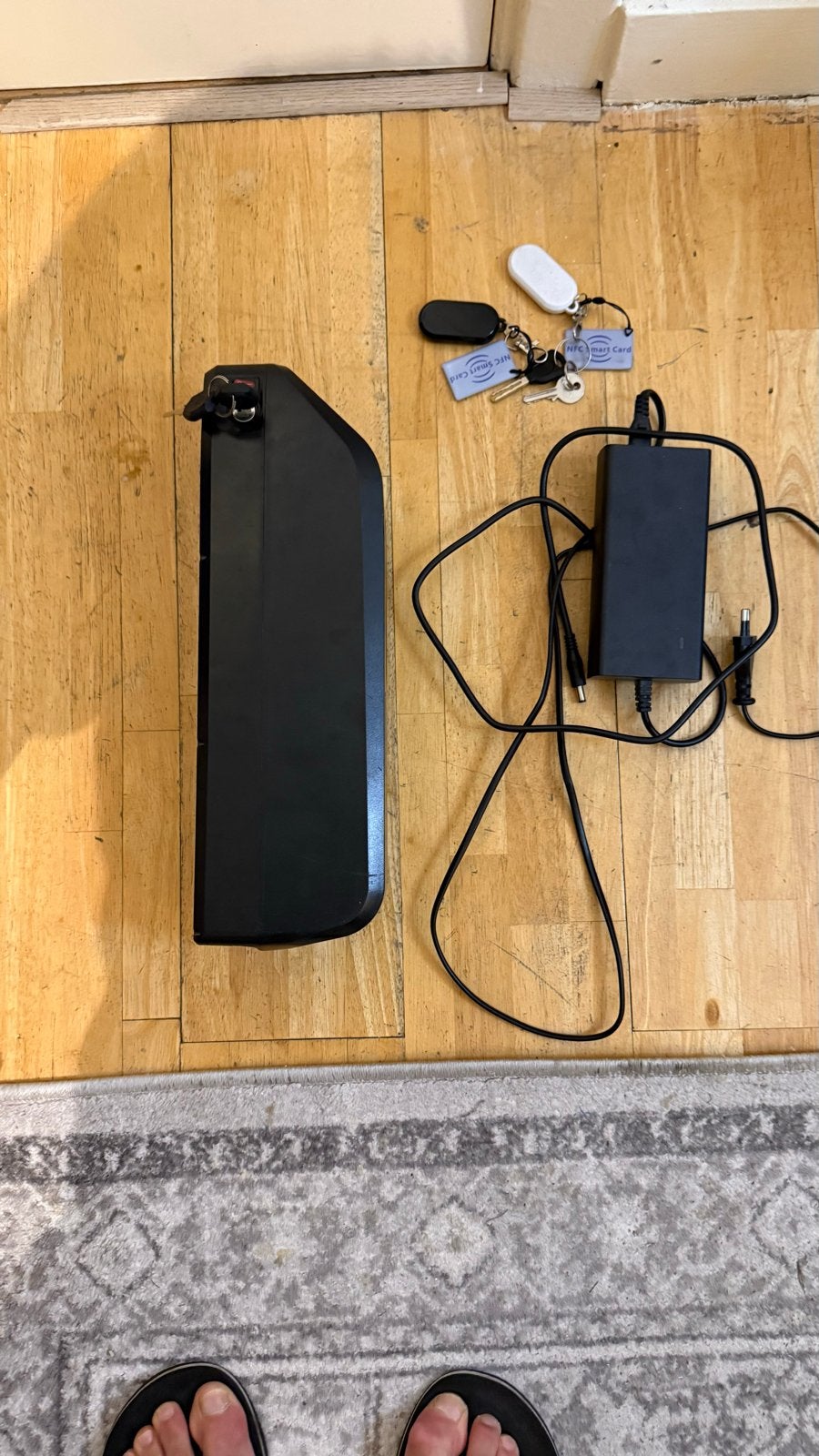E-bike accu en lader met sleutels (fiets gestolen), Gebruikt
